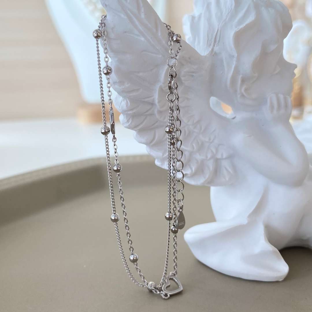 [Revel Jewelry]華奢な二層のラブハートブレスレット