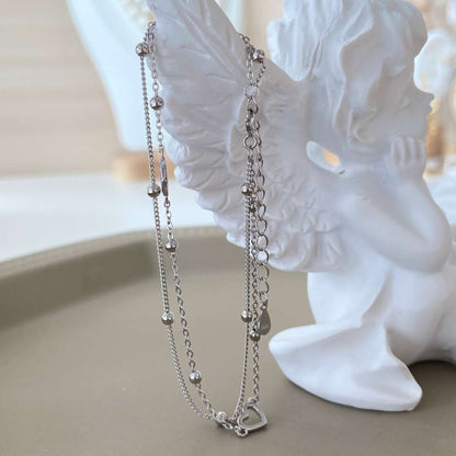 [Revel Jewelry]華奢な二層のラブハートブレスレット
