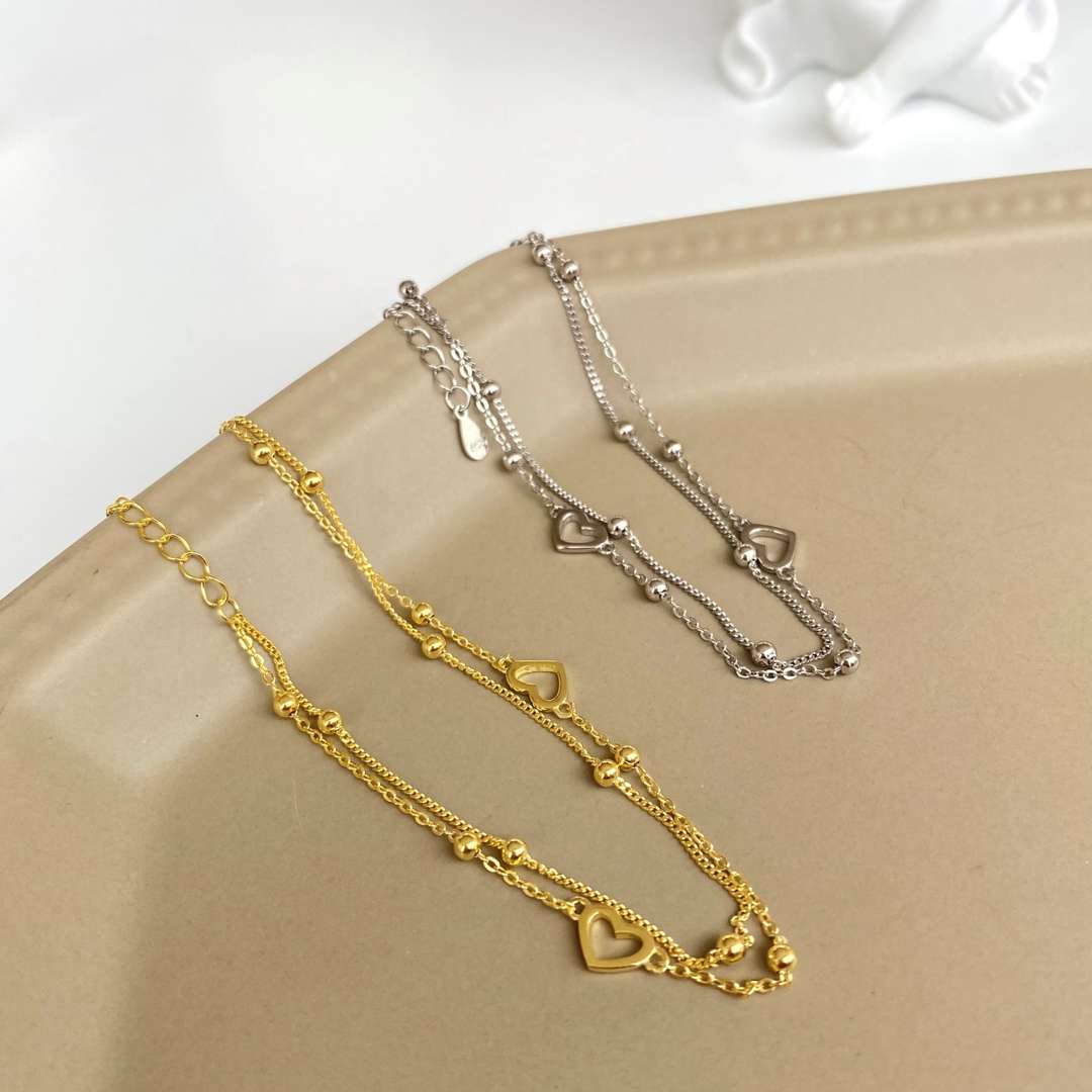 [Revel Jewelry]華奢な二層のラブハートブレスレット