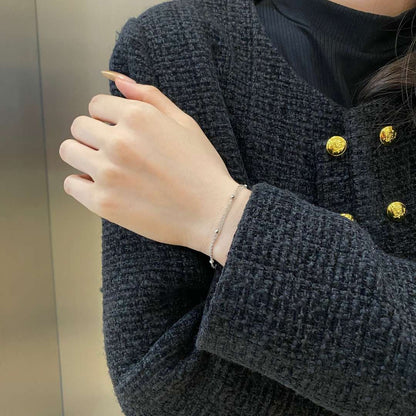 [Revel Jewelry]Zartes Perlenarmband mit doppelter Lage