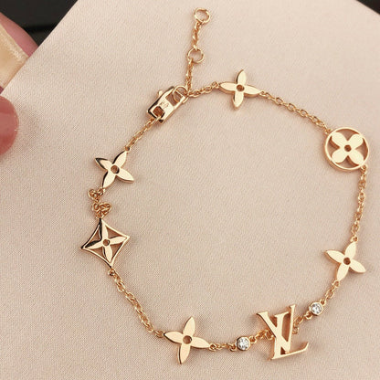 [Revel Jewelry]STAR AND SUN 7 MOTIVE GOLDARMREIF