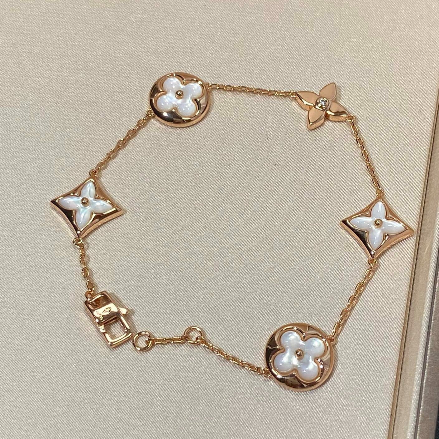 [Revel Jewelry]STAR AND SUN 5 MOTIF MOP PINK GOLD BRACELET