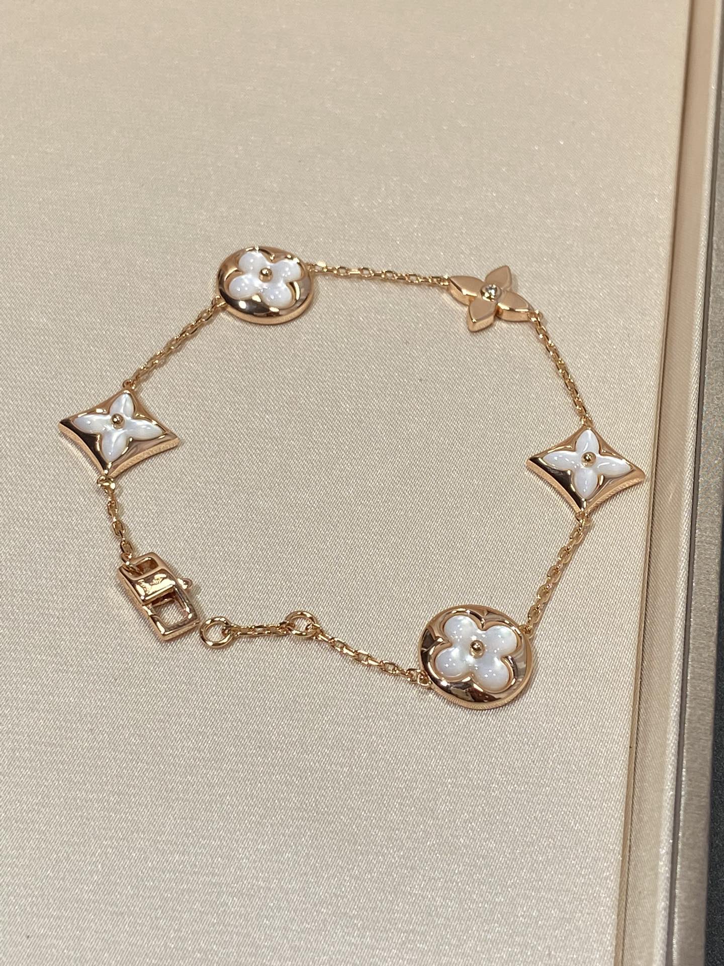 [Revel Jewelry]STAR AND SUN 5 MOTIF MOP PINK GOLD BRACELET