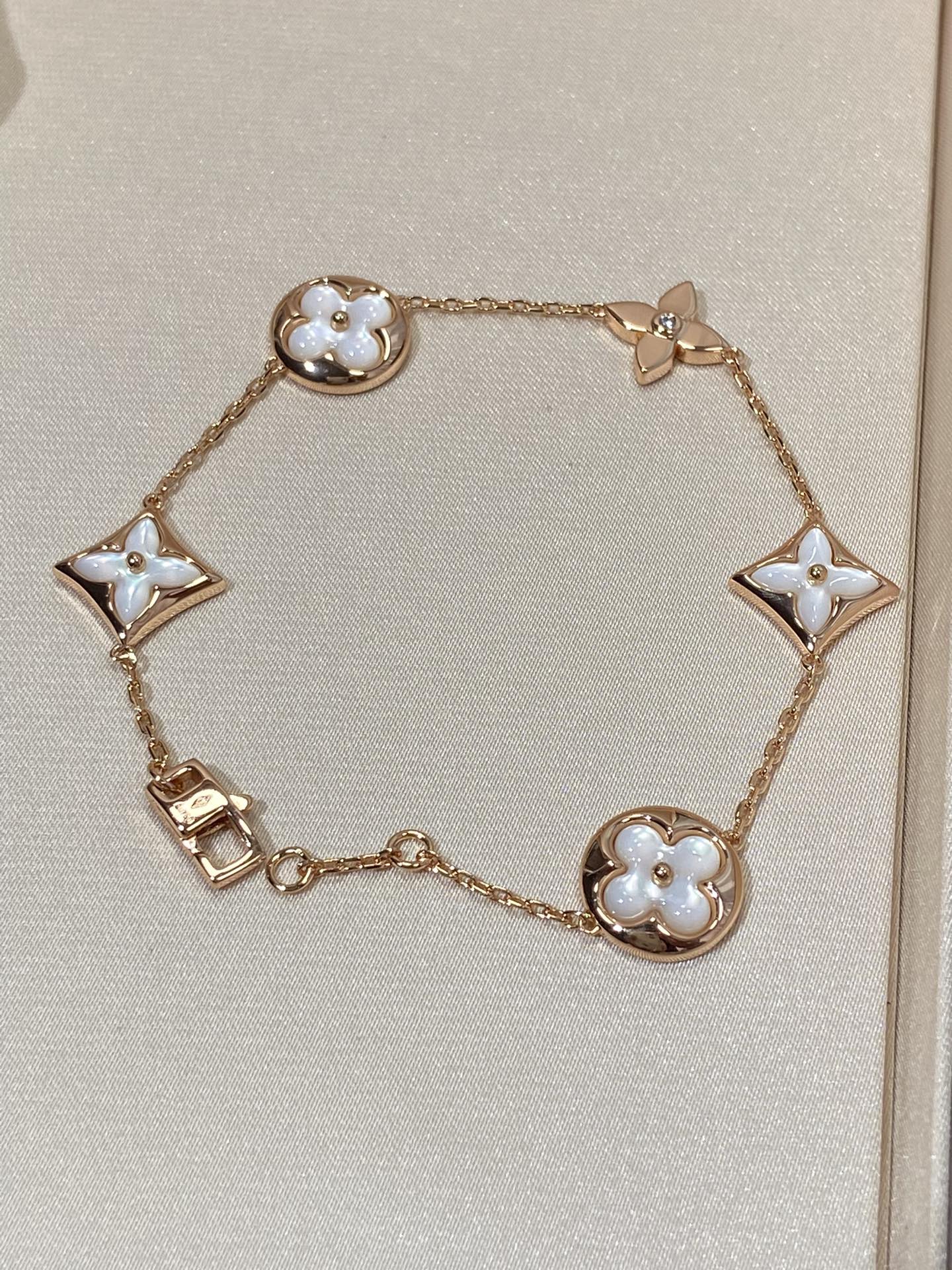 [Revel Jewelry]STAR AND SUN 5 MOTIF MOP PINK GOLD BRACELET