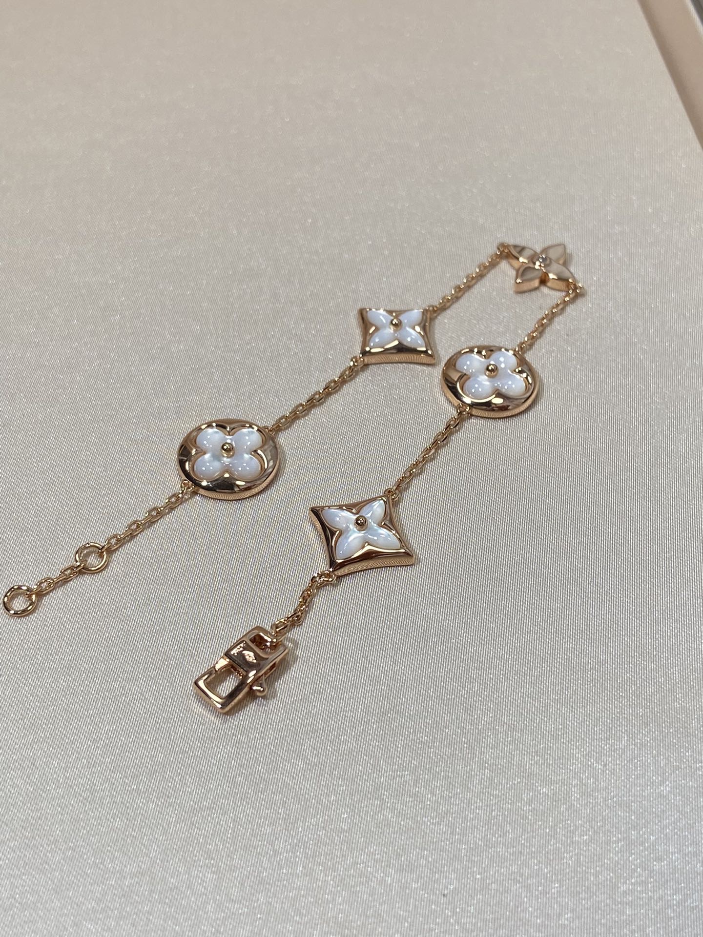 [Revel Jewelry]STAR AND SUN 5 MOTIF MOP PINK GOLD BRACELET