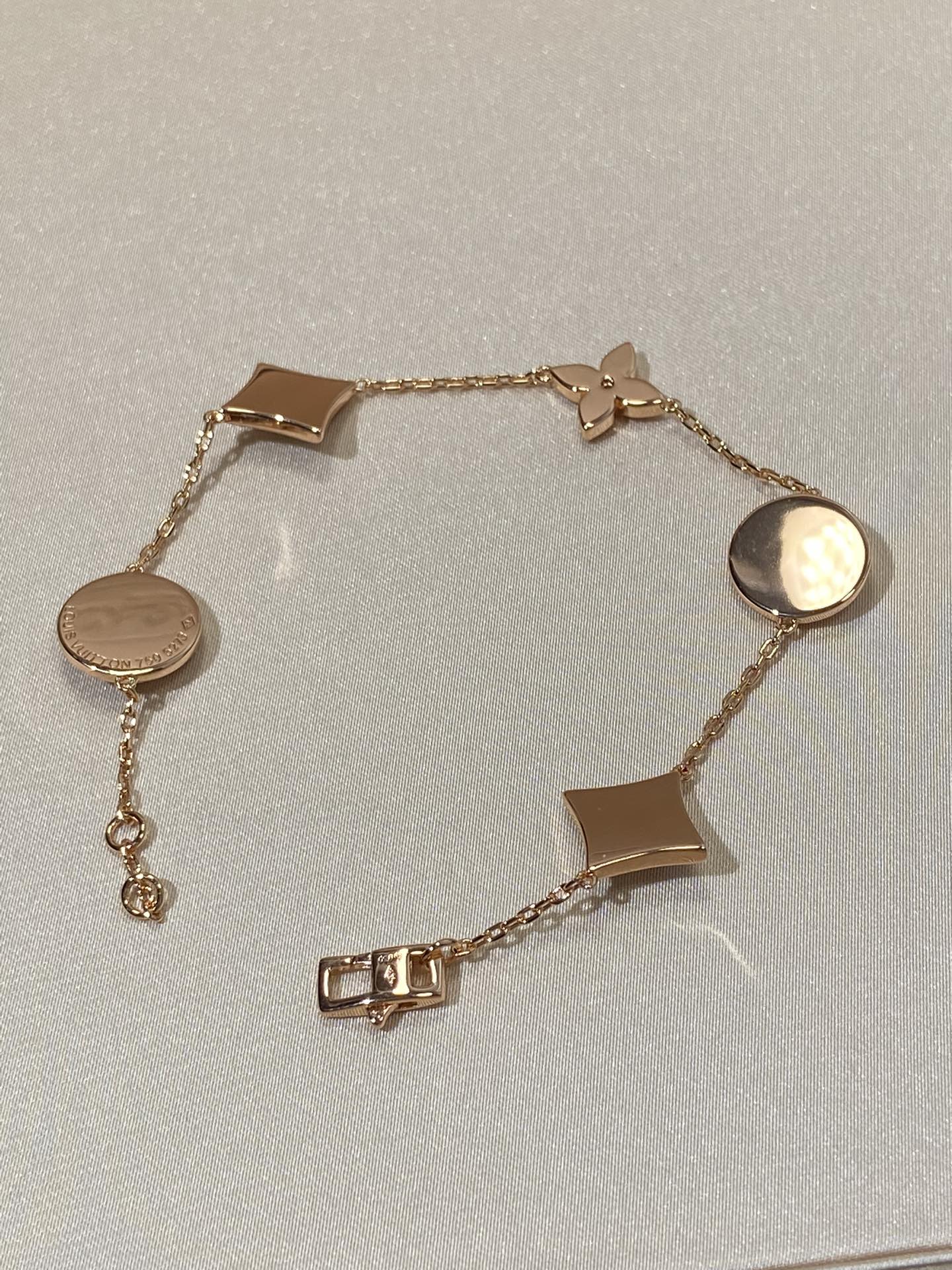 [Revel Jewelry]STAR AND SUN 5 MOTIF MOP PINK GOLD BRACELET