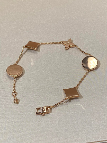 [Revel Jewelry]STAR AND SUN 5 MOTIF MOP PINK GOLD BRACELET