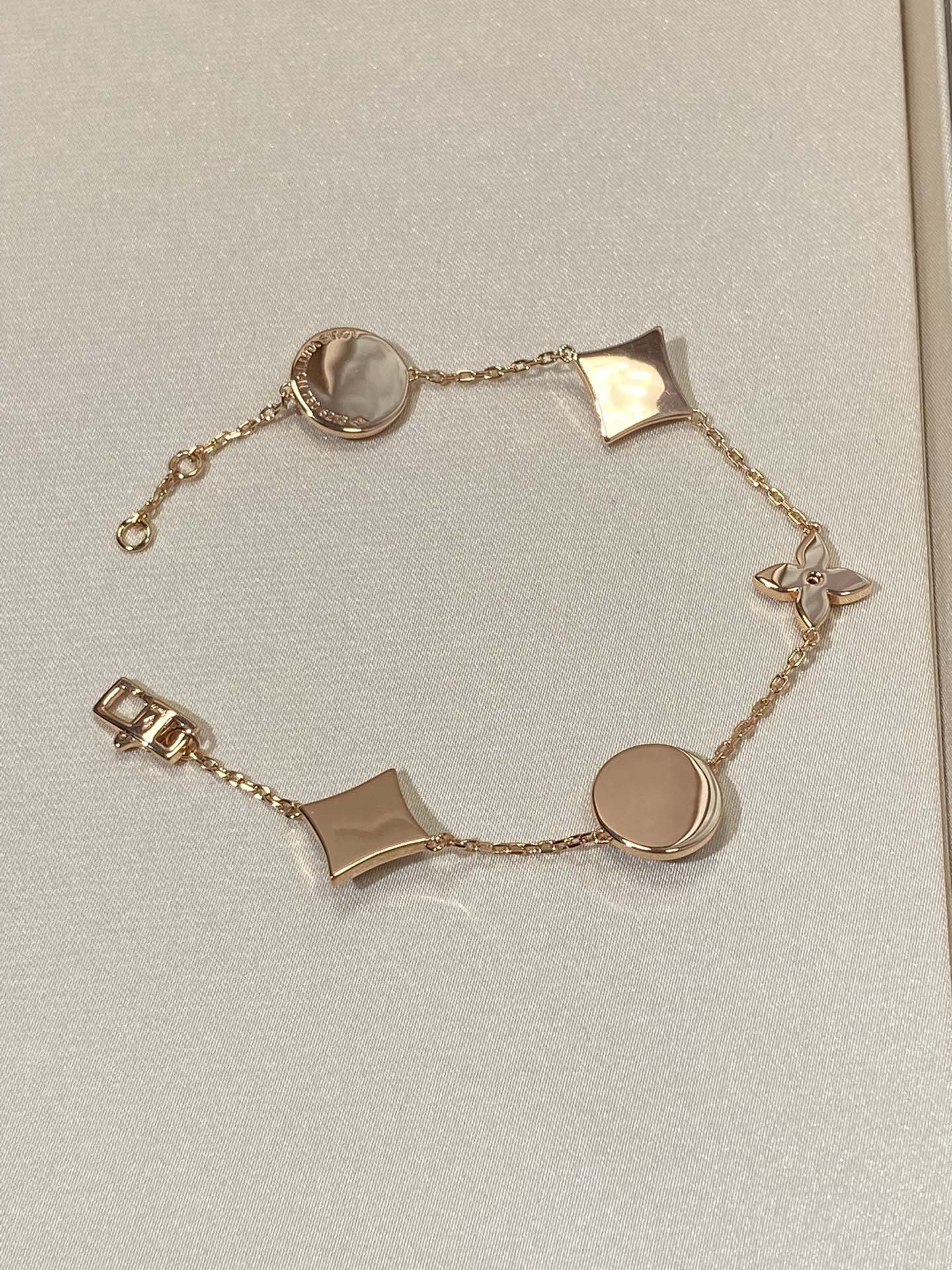 [Revel Jewelry]STAR AND SUN 5 MOTIF MOP PINK GOLD BRACELET