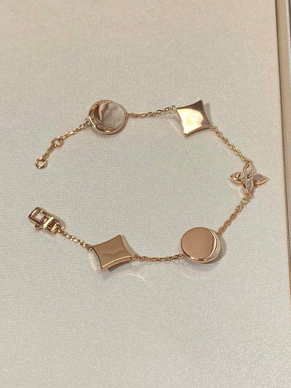 [Revel Jewelry]STAR AND SUN 5 MOTIF MOP PINK GOLD BRACELET