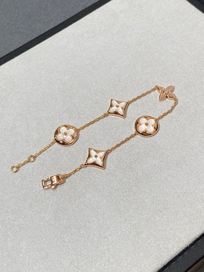 [Revel Jewelry]STAR AND SUN 5 MOTIF MOP PINK GOLD BRACELET