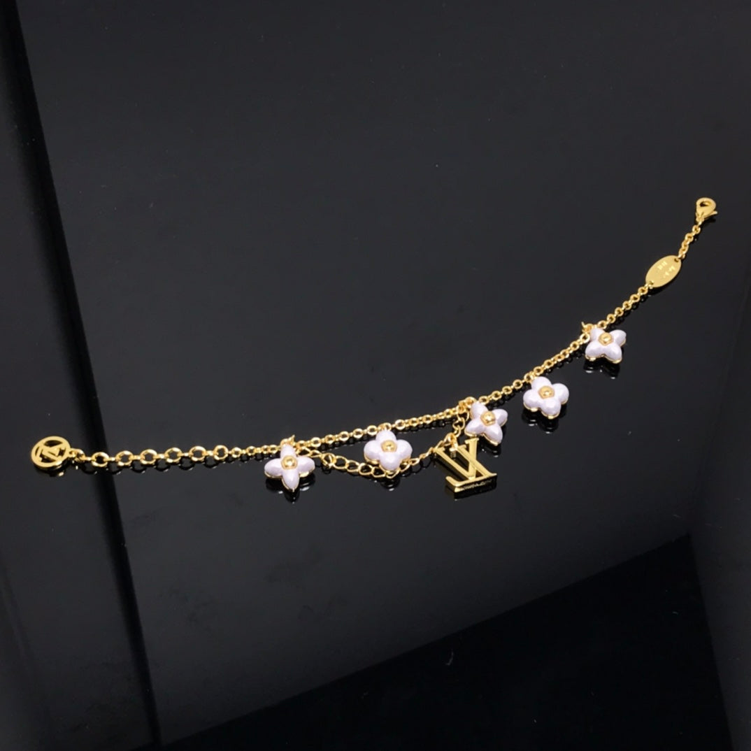 [Revel Jewelry]LOGO 6 MOTIF STAR AND SUN GOLD BRACELET