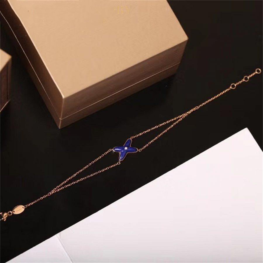[Revel Jewelry]Hollow Design Four-Leaf Clover Flower Shape Bracelet