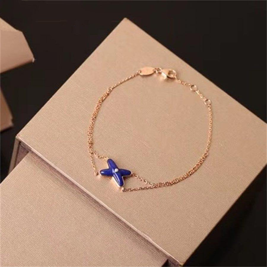 [Revel Jewelry]Hollow Design Four-Leaf Clover Flower Shape Bracelet