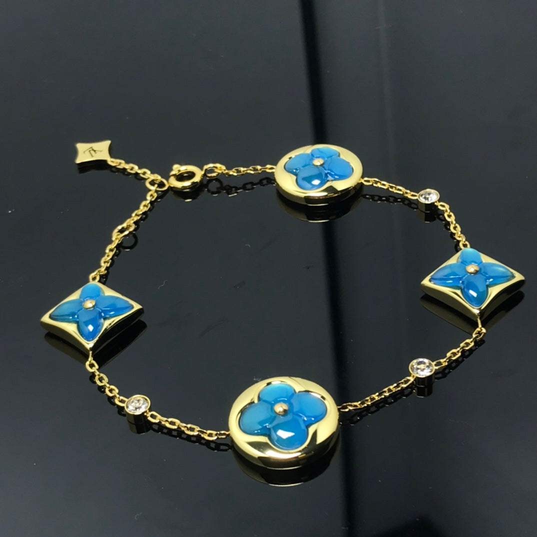 [Revel Jewelry]ARMBAND "STERN UND SONNE" MIT 4 MOTIVEN, BLAU